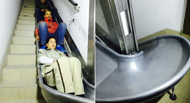 组图:上海七旬 老人研发逃生神梯  26楼到1楼仅